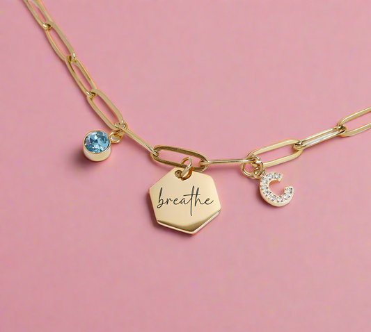 Golden Paper Clip Necklace with birthstone, crystal initial and engraved pendant.