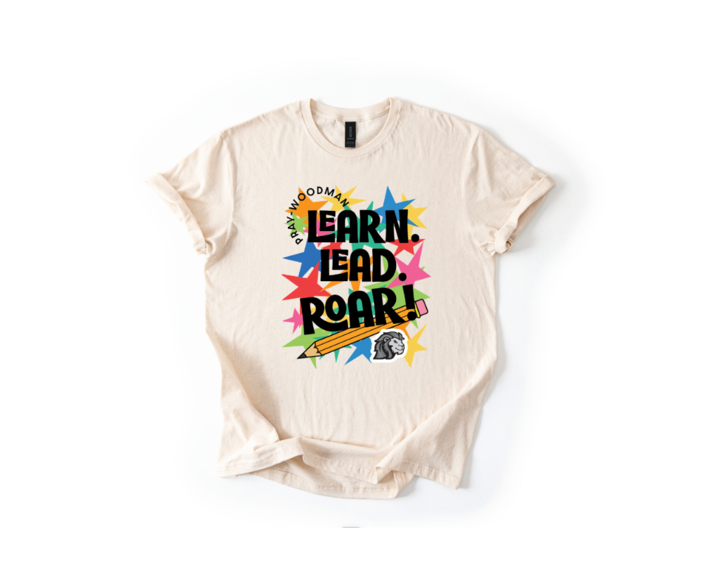 A cream-colored short-sleeve t-shirt with a colorful graphic print on the front. The graphic features the text 'LEARN.